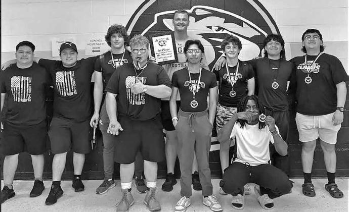 From left: MPHS Tiger Powerlifting team members (L to R) Jose Gonzalez, Andrew Guerette, Ryder Marshall, Clayton Miller, Coach Blake Lodes, Alejandro Castro, Blake Broach, Juymil Lewis, Luis Alvarado, Bruno DeLeon COURTESY PHOTO